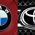 BMW ir Toyota ženklai
