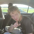 Asociatyvi iliustracija: apsvaigęs vairuotojas policijos automobilyje