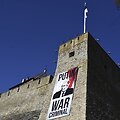 Plakatas Estijoje &scaron;alia sienos su Rusija. /  / AP