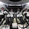 Į Žemę po a&scaron;tuonių mėnesių grįžo keturi TKS užstrigę astronautai / NASA / Getty Images via AFP