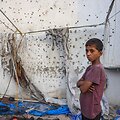 Palestinietis berniukas Gazos Ruože / BASHAR TALEB / AFP