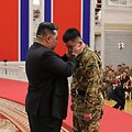 Kim Jong Unas karių pagerbimo ceremonijoje / STR / AFP