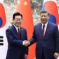 Lee Jae-myungas su Xi Jinpingu /  / AP
