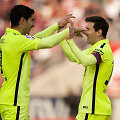 Luisas Suarezas ir Lionelis Messi