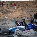 Po gaisro Graikijos migrantų stovykloje tūkstančiai žmonių trečią naktį praleido lauke
