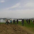Makedonijos policija a&scaron;arinėmis dujomis vaikė migrantus prie sienos su Graikija