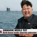 &Scaron;iaurės Korėjos vadovas Kim Jong-Unas džiaugiasi raketos bandymo rezultatais