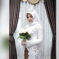 Intan Syari pozuoja vestuvinėje fotosesijoje. 