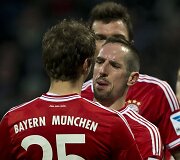Franckas Ribery ir Thomas Muelleris