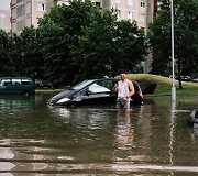 Kaune praūžus liūčiai ėmė skęsti gatvės