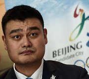 Už Pekiną agituoja ir Yao Mingas