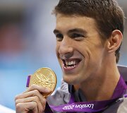 JAV plaukikas Michaelas Phelpsas Londono olimpiadoje laimėjo keturis aukso medalius