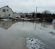 Nemėžio A.Mickevičiaus gatvė per pavasarinį polaidį