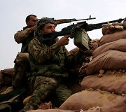 Irako pajėgos kaunasi su &bdquo;Islamo valstybe&ldquo; dėl miesto &scaron;alies vakaruose