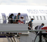 Į Lietuvą parskraidinama dar viena grupė afganistaniečių