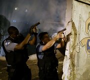 Rio de Žaneire įsiplieskė audringi protestai