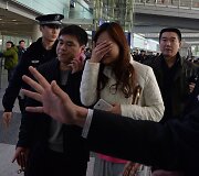 &bdquo;Malaysia Airlines&ldquo; lėktuvo keleivių artimieji Pekine