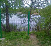 Aplinkosaugininkai pradėjo griauti neleistinas tvoras prie vandens telkinių