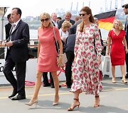 Prancūzijos ir Argentinos prezidentų žmonos Brigitte Trogneux ir Juliana Awada