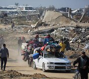 Palestiniečiai grįžta į namus nuniokotoje &scaron;iaurinėje Gazoje