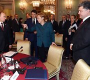 Vladimiras Putinas, Angela Merkel ir Petro Poro&scaron;enka