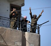 JAV remiamos pajėgos Sirijoje skelbia visi&scaron;kai užėmusios buvusią &bdquo;Islamo valstybės&ldquo; sostinę Raką