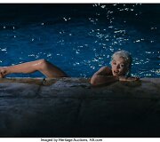 Marilyn Monroe maudynės baseine