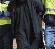 Policijos vedamas asmuo, įtariamas verbavimu į islamistų kovotojų grupuotes.