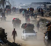 Palestiniečiai grįžta į namus nuniokotoje &scaron;iaurinėje Gazoje