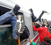 Migrantai traukiniuose