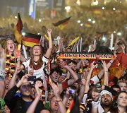 Berlyne futbolo sirgaliai &scaron;ventė Vokietijos rinktinės pergalę pasaulio futbolo čempionate