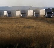 Rusijos &bdquo;humanitarinės pagalbos&ldquo; sunkvežimiai