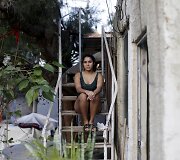 Luisa de Oliveira, 23 metų, nusprendė nei&scaron;sikelti i&scaron; griaunamo lū&scaron;nyno