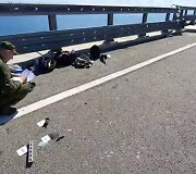 Rusijos tyrėjai ant Krymo tilto