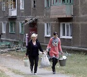 Tvarkosi Delbacevo miesto gyventojai.