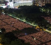 Tiananmenio aik&scaron;tėje vyko 1989 m. protestuotojų žudynių minėjimas
