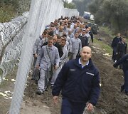 Rugsėjo 11 diena. Sieną nuo migrantų Vengrijoje statė kaliniai
