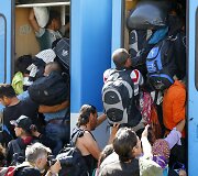 Migrantai traukiniuose