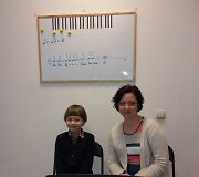 Yamaha muzikos mokyklos nuotrauka.