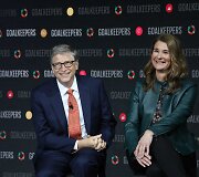 Billas Gatesas ir Melinda Gates