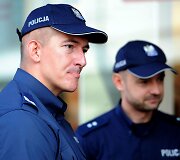 Lenkų policininkai patruliuoja Harlou mieste 