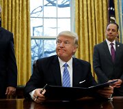 Pirmoji prezidento Donaldo Trumpo savaitė Baltuosiuose rūmuose