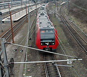 Per Kopenhagą važiuojantis traukinys. Jame galioja miesto transporto bilietai