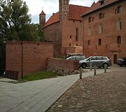 Lidzbarko pilyje triūsė pats Mikołajus Kopernikas. 