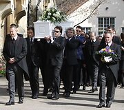 Laidotuvių ceremonijos akimirka