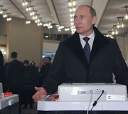 Balsavo Vladimiras Putinas.