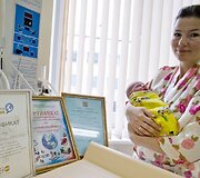 Septyniamilijardasis pasaulio žmogus, jo mama Jelena Nikolajeva