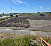 Asfaltuojama Palangos Aurum 1006 km lenktynių Padock zona