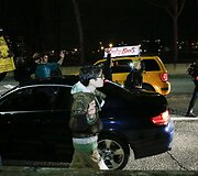 I&scaron;teisinus policininką, nu&scaron;ovusį juodaodį Michaelą Browną, Niujorke žmonės susirinko į demonstraciją 2014 m. lapkričio 26 d. 
