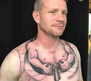 Vilkiko vairuotojas Kenis Oleren&scaron;ou i&scaron;garsėjo tatuiruote.